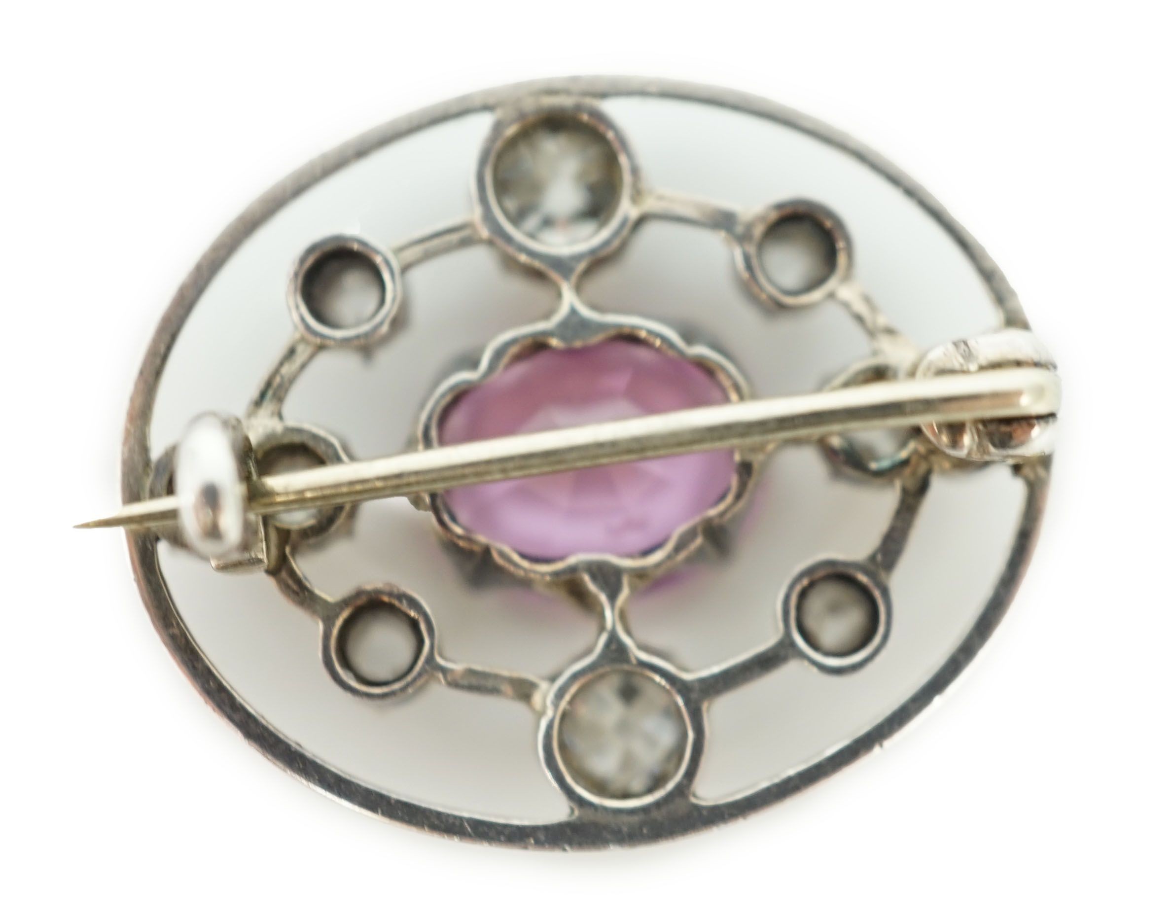 A 19th century gold and silver, pink topaz and diamond set openwork oval brooch